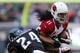 PHILADELPHIA, PA - DECEMBER 1: Wide receiver Larry Fitzgerald #11 of the Arizona Cardinals is tackled by cornerback Bradley Fletcher #24 of the Philadelphia Eagles in the fourth quarter during a game at Lincoln Financial Field on December 1, 2013 in Phila