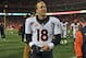 KANSAS CITY, MO - DECEMBER 01: Quarterback Peyton Manning #18 of the Denver Broncos walks off the field after beating the Kansas City Chiefs on December 1, 2013 at Arrowhead Stadium in Kansas City, Missouri. Denver beat Kansas City 35-28. (Photo by Pet