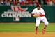 Shortstop Daniel Descalso fields a ground ball during Game 4 of the World Series.
