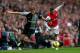 LONDON, ENGLAND - NOVEMBER 17: Alex Oxlade-Chamberlain of Arsenal is challenged by Jan Vertonghen of Tottenham Hotspur during the Barclays Premier league match between Arsenal and Tottenham Hotspur at Emirates Stadium on November 17, 2012 in London, Engl