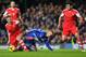LONDON, ENGLAND - DECEMBER 01: Luke Shaw of Southampton (L) battles with Fernando Torres of Chelsea as Dejan Lovren of Southampton (R) moves in during the Barclays Premier League match between Chelsea and Southampton at Stamford Bridge on December 1, 201