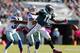 PHILADELPHIA, PA - OCTOBER 20: Wide receiver DeSean Jackson #10 of the Philadelphia Eagles can't catch an over thrown ball as cornerback Orlando Scandrick #32 and linebacker Sean Lee #50 of the Dallas Cowboys defend in the third quarter during a game at L