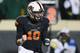 STILLWATER, OK - NOVEMBER 23: Clint Chelf #10 of the Oklahoma State Cowboys celebrates a touchdown against the Baylor Bears in the third quarter at Boone Pickens Stadium on November 23, 2013 in Stillwater, Oklahoma. (Photo by Ronald Martinez/Getty Image