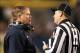 Nov 9, 2013; Pittsburgh, PA, USA; Notre Dame Fighting Irish head coach Brian Kelly (left) talks to head linesman Steve Clein (right) against the Pittsburgh Panthers during the first quarter at Heinz Field. Mandatory Credit: Charles LeClaire-USA TODAY Spor