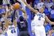 Nov 9, 2013; Newark, NJ, USA; Niagara Purple Eagles guard Antoine Mason (14) drives to the basket against Seton Hall Pirates guard/forward Stephane Manga (45) and forward Brandon Mobley (2) during the second half at Prudential Center. Seton Hall Pirates