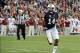 Nov 30, 2013; Auburn, AL, USA; Auburn Tigers quarterback Nick Marshall (14) points as he carries the ball in the 2nd quarter against the Alabama Crimson Tide at Jordan Hare Stadium. Mandatory Credit: Shanna Lockwood-USA TODAY Sports