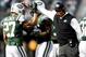 EAST RUTHERFORD, NJ - DECEMBER 1: Head coach Rex Ryan of the New York Jets greets Dee Milliner #27 of the New York Jets during their game against the Miami Dolphins at MetLife Stadium on December 1, 2013 in East Rutherford, New Jersey. (Photo by Jeff