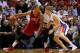 MIAMI, FL - DECEMBER 03: Michael Beasley #8 of the Miami Heat posts up Kyle Singler #25 of the Detroit Pistons during a game at American Airlines Arena on December 3, 2013 in Miami, Florida. NOTE TO USER: User expressly acknowledges and agrees that, by d