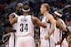 Nov 15, 2013; Phoenix, AZ, USA; Brooklyn Nets forward Kevin Garnett (2) talks with forward Paul Pierce (34) , forward Mason Plumlee (1) and guard Jason Terry (31) on the court in the second half of the game against the Phoenix Suns at US Airways Center. T