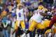 Nov 29, 2013; Baton Rouge, LA, USA; LSU Tigers quarterback Zach Mettenberger (8) passes the ball against the Arkansas Razorbacks in the second half at Tiger Stadium. LSU defeated Arkansas 31-27. Mandatory Credit: Crystal LoGiudice-USA TODAY Sports
