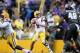 Nov 23, 2013; Baton Rouge, LA, USA; LSU Tigers quarterback Zach Mettenberger (8) looks to pass the ball against the Texas A&M Aggies in the first half at Tiger Stadium. Mandatory Credit: Crystal LoGiudice-USA TODAY Sports