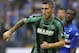 GENOA, ITALY - NOVEMBER 03: Luca Marrone of US Sassuolo Calcio in action during the Serie A match between UC Sampdoria v US Sassuolo Calcio at Stadio Luigi Ferraris on November 3, 2013 in Genoa, (Photo by Marco Luzzani/Getty Images)