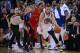 December 3, 2013; Oakland, CA, USA; Golden State Warriors point guard Stephen Curry (30) is fouled by Toronto Raptors shooting guard DeMar DeRozan (10) during the fourth quarter at Oracle Arena. The Warriors defeated the Raptors 112-103. Mandatory Credit: