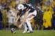 Auburn punter Steven Clark reaches for the ball after he dropped the snap. He would eventually get brought down deep in LSU's territory.