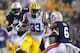 Jeremy Hill begins to juke Auburn cornerback Jonathon Mincy, who misses the tackle. Hill would eventually score his first of three touchdowns on the run.