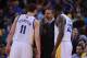 December 3, 2013; Oakland, CA, USA; Golden State Warriors head coach Mark Jackson (center) instructs shooting guard Klay Thompson (11) and small forward Draymond Green (23) during the fourth quarter against the Toronto Raptors at Oracle Arena. The Warrior