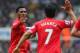 NEWCASTLE UPON TYNE, ENGLAND - OCTOBER 19: Daniel Sturridge of Liverpool high fives Luis Suarez of Liverpool during the Barclays Premier League match between Newcastle United and Liverpool at St James' Park on October 19, 2013 in Newcastle upon Tyne, Eng