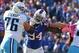 Oct. 21, 2012; Orchard Park, NY, USA; Tennessee Titans tackle David Stewart (76) blscks Buffalo Bills defensive end Mario Williams (94) during the second half at Ralph Wilson Stadium. Titans beat the Bills 35 to 34. Mandatory Credit: Timothy T. Ludwig-