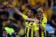 LONDON, ENGLAND - MAY 25: Ilkay Gundogan of Borussia Dortmund (L) celebrates with team-mate Marcel Schmelzer after scoring a goal from the penalty spot during the UEFA Champions League final match between Borussia Dortmund and FC Bayern Muenchen at Wembl