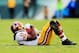 PHILADELPHIA, PA - NOVEMBER 17: Quarterback Robert Griffin III #10 of the Washington Redskins lays on the field after being tackled by free safety Kurt Coleman #42 of the Philadelphia Eagles at Lincoln Financial Field on November 17, 2013 in Philadelphia,