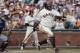 SAN FRANCISCO, CA - SEPTEMBER 29: Pablo Sandoval #48 of the San Francisco Giants follows through on an RBI-single against the San Diego Padres in the fourth inning at AT&T Park on September 29, 2013 in San Francisco, California. The Giants won 7-6 with a
