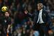 MANCHESTER, ENGLAND - DECEMBER 01: Manuel Pellegrini, manager of Manchester City throws the ball back during the Barclays Premier League match between Manchester City and Swansea City at Etihad Stadium on December 1, 2013 in Manchester, England. (Photo