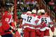 WASHINGTON, DC - DECEMBER 03: Members of the Carolina Hurricanes celebrate after scoring a first period goal against the Washington Capitals at Verizon Center on December 3, 2013 in Washington, DC. (Photo by Rob Carr/Getty Images)