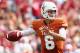 DALLAS, TX - OCTOBER 12: Case McCoy #6 of the Texas Longhorns looks for an open receiver in the first quarter against the Oklahoma Sooners at the Cotton Bowl on October 12, 2013 in Dallas, Texas. (Photo by Tom Pennington/Getty Images)