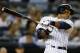 NEW YORK, NY - SEPTEMBER 5: Robinson Cano #24 of the New York Yankees hits a double off the right field wall scoring two runs in the third inning against the Boston Red Sox in a MLB baseball game at Yankee Stadium on September 5, 2013 in the Bronx boroug