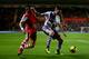 SOUTHAMPTON, ENGLAND - DECEMBER 04: Ciaran Clark of Aston Villa holds off Nathaniel Clyne of Southampton during the Barclays Premier League match between Southampton and Aston Villa at St Mary's Stadium on December 4, 2013 in Southampton, England. (Phot