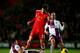 SOUTHAMPTON, ENGLAND - DECEMBER 04: Ciaran Clark of Aston Villa tackles Adam Lallana of Southampton during the Barclays Premier League match between Southampton and Aston Villa at St Mary's Stadium on December 4, 2013 in Southampton, England. (Photo by