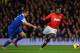 MANCHESTER, ENGLAND - DECEMBER 04: Phil Jagielka of Everton competes with Danny Welbeck of Manchester United during the Barclays Premier League match between Manchester United and Everton at Old Trafford on December 4, 2013 in Manchester, England. (Phot