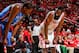 HOUSTON, TX - MAY 3: Kevin Durant #35 of the Oklahoma City Thunder and James Harden #13 of the Houston Rockets wait to resume play in Game Six of the Western Conference Quarterfinals during the 2013 NBA Playoffs on May 3, 2013 at the Toyota Center in Hous