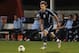 ORLANDO, FL - FEBRUARY 16: Midfielder Graham Zusi #8 of Sporting Kansas City runs upfield against the Tampa Bay Rowdies in the third round of the Disney Pro Soccer Classic at ESPN Wide World of Sports Complex on February 16, 2013 in Orlando, Florida. (P