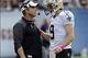 Oct 6, 2013; Chicago, IL, USA; New Orleans Saints quarterback Drew Brees (9) talks with head coach Sean Payton during the second half against the Chicago Bears at Soldier Field. Mandatory Credit: Matt Marton-USA TODAY Sports