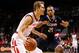 Nov 8, 2013; Brooklyn, NY, USA; Maryland Terrapins guard/forward Jake Layman (10) drives past Connecticut Huskies guard Omar Calhoun (21) during the first half at Barclays Center. Mandatory Credit: Anthony Gruppuso-USA TODAY Sports