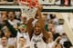 EAST LANSING, MI - DECEMBER 04: Adreian Payne #5 of the Michigan State Spartans reacts after a first half dunk behind Nate Britt #0 of the North Carolina Tar Heels at the Jack T. Breslin Student Events Center on December 4, 2013 in East Lansing, Michigan