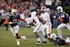 Nov 30, 2013; Auburn, AL, USA; Alabama Crimson Tide running back T.J. Yeldon (4) is tackled by Auburn Tigers cornerback Chris Davis (11) and defensive back Jonathan Jones (3) during the second quarter at Jordan Hare Stadium. Mandatory Credit: John David M
