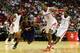 HOUSTON, TX - DECEMBER 04: Eric Bledsoe #2 of the Phoenix Suns dribbles past Dwight Howard #12 of the Houston Rockets during the game at Toyota Center on December 4, 2013 in Houston, Texas. NOTE TO USER: User expressly acknowledges and agrees that, by do