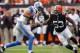 CLEVELAND, OH - OCTOBER 13: Wide receiver Kris Durham #18 of the Detroit Lions runs the ball by linebacker Craig Robertson #53 of the Cleveland Browns at FirstEnergy Stadium on October 13, 2013 in Cleveland, Ohio. (Photo by Matt Sullivan/Getty Images)