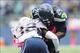 Oct 14, 2012; Seattle, WA, USA; Seattle Seahawks running back Marshawn Lynch (24) runs with the ball against New England Patriots cornerback Devin McCourty (32) during the 2nd half at CenturyLink Field. Seattle defeated New England 24-23. Mandatory Credit