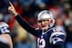 FOXBORO, MA - NOVEMBER 24: Quarterback Tom Brady #12 of the New England Patriots celebrates against the Denver Broncos during a game at Gillette Stadium on November 24, 2013 in Foxboro, Massachusetts. (Photo by Jared Wickerham/Getty Images)
