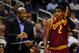 Oct 11, 2013; Orlando, FL, USA; Cleveland Cavaliers head coach Mike Brown talks with point guard Kyrie Irving (2) during the first quarter during game against the Orlando Magic at Amway Center. Mandatory Credit: David Manning-USA TODAY Sports