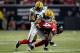 ATLANTA, GA - JANUARY 15: Roddy White #84 of the Atlanta Falcons is tackled on a reception by Tramon Williams #38 of the Green Bay Packers during their 2011 NFC divisional playoff game at Georgia Dome on January 15, 2011 in Atlanta, Georgia. (Photo by K