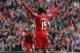 LIVERPOOL, ENGLAND - AUGUST 17: Daniel Sturridge of Liverpool celebrates after scoring the first goal during the Barclays Premier League match between Liverpool and Stoke City at Anfield on August 17, 2013 in Liverpool, England. (Photo by Clive Brunskil