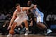 NEW YORK, NY - DECEMBER 03: Brook Lopez #11 of the Brooklyn Nets dribbles against J.J. Hickson #7 of the Denver Nuggets during the first quarter at Barclays Center on December 3, 2013 in the Brooklyn borough of New York City. NOTE TO USER: User expressly