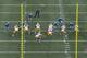 Matt Flynn tries to secure the awkward snap, but the increased time in the pocket led to a sack.