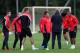MANCHESTER, ENGLAND - SEPTEMBER 16: Shinji Kagawa (C) of Manchester United talks to his team manager David Moyes during a first team training session ahead of their UEFA Champions League match against Bayer Leverkusen at Carrington Training Ground on Sep
