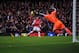 LONDON, ENGLAND - FEBRUARY 02: Asmir Begovic of Stoke City saves an attepted goal by Alex Oxlade-Chamberlain of Arsenal during the Barclays Premier League match between Arsenal and Stoke City at Emirates Stadium on February 2, 2013 in London, England. (