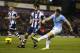 WEST BROMWICH, ENGLAND - DECEMBER 04: James Milner of Manchester City takes a shot at the West Bromwich goal during the Premier League match between West Bromwich Albion and Manchester City at The Hawthorns on December 4, 2013 in West Bromwich, England.